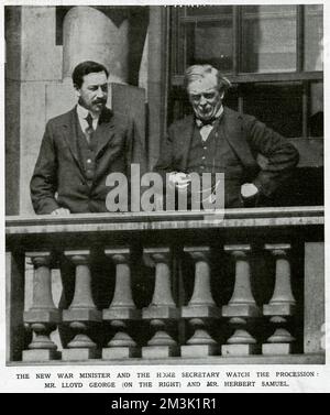 Liberal politicians David Lloyd George (1863 - 1945), and Herbert Samuel (1870 - 1963), watching a passing parade. Lloyd George was War Minister and Samuel Home Secretary when the photograph was taken in July 1916. Later that year Lloyd George would replace Herbert Henry Asquith as Prime Minister, a position he would hold until 1922. Samuel again served as Home Secretary in 1931, was High Commissioner for Palestine from 1920 to 1925, and was the author of several philosophical works.     Date: 22 July 1916 Stock Photo