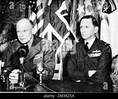 Photograph showing General Dwight D. Eisenhower (left), the Supreme Allied Commander-in-Chief, and Air Chief-Marshal Sir Arthur Tedder, the Deputy Supreme Commander, pictured at their headquarters in Rheims, May 1945.     Date: 1945 Stock Photo
