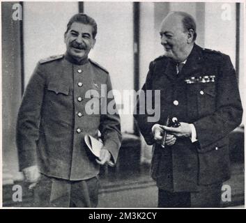 Josef Stalin (1879 - 1953), (left), leader of the Soviet Union, and Winston Churchill (1874 - 1965), Prime Minister of Great Britain, at the Yalta Conference in the Crimea. Stock Photo