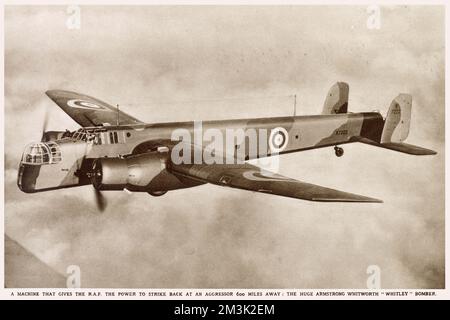 Photograph of a Royal Air Force Armstrong Whitworth 'Whitley' bomber in flight. Stock Photo