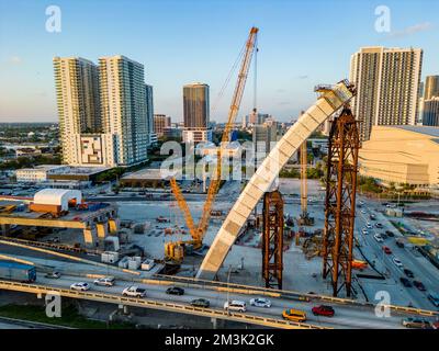 Miami, FL, USA - December 14, 2022: Aerial drone photo of the new Signature Bridge Downtown Miami under construction Stock Photo