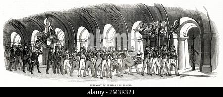 Procession through the Thames Tunnel, between Rotherhithe and Wapping, to mark its opening on 25 March 1843. Sir Marc Isambard Brunel (1769 - 1849), the French engineer and inventor, is seen on the left of this image, raising his top hat.     Date: 25 March 1843 Stock Photo