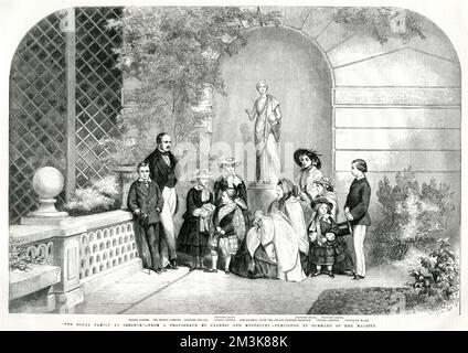 Queen Victoria and her family at Osborne House, a mouth after the birth of Queen Victoria and Prince Albert's youngest child Princess Beatrice was born. Left; Prince Alfred, The Prince Consort, Princess Helena, Princess Alice, Prince Arthur, Queen Victoria with Princess Beatrice, Princess Royal, Princess Louisa, Prince Leopold and Prince Wales.     Date: May 1857 Stock Photo