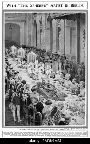 A state banquet held in the  White Hall of the Great  Schloss in Berlin to celebrate  the forthcoming marriage of  the Kaiser's only daughter, Princess Viktoria Luise of Prussia, to Prince Ernest Augustus of Brunswick- Luneburg, son of the Duke and Duchess of Cumberland. On the left hand side of the table, Queen Mary sits next to Kaiser Wilhelm II, close to a lavish table decoration, and opposite King George V chats to the Kaiser's wife, Empress Augusta Victoria.     Date: 31 May 1913 Stock Photo