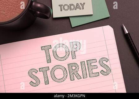 Sign displaying Top Stories. Conceptual photo Most read important news information messages Headlines Stock Photo