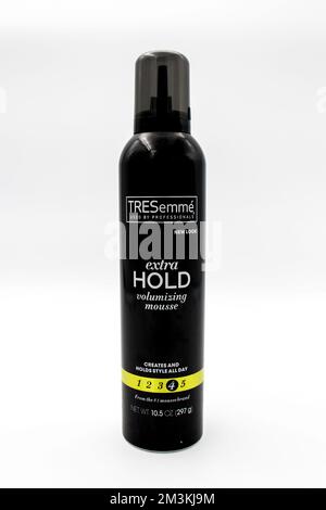 Isolated bottle of Tresemme extra hold mousse used by