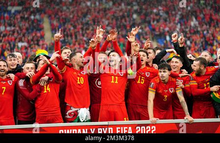 File photo dated 05-06-2022 of Wales players celebrating after ending their 64-year wait to play at a World Cup by beating Ukraine 1-0 in a pulsating play-off final in Cardiff. Issue date: Friday December 16, 2022. Stock Photo