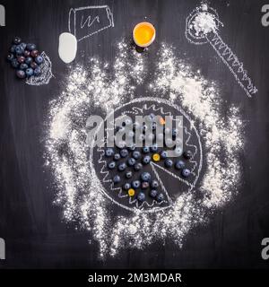 Baking concept - ingredients for blueberry pie, sprinkled wheat flour circle Stock Photo