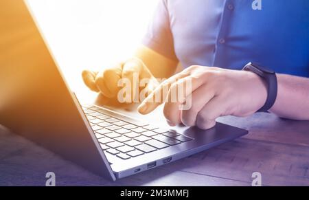 Male hands typing on computer keyboard closeup, business man or student using laptop at home, online learning, internet marketing, working from home, Stock Photo