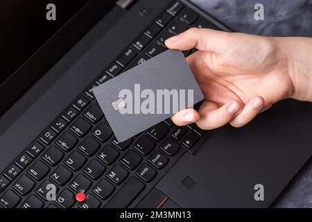 Hand holding template mockup online credit card payment for purchases from online stores and online shopping, Credit card close up shot Stock Photo