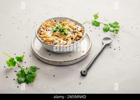 Middle Eastern delicious dip 'Baba Ghanoush' or 'Baba Ghanouj'. It is tasty appetizer made with roasted eggplant, fresh garlic, lemon juice and tahini Stock Photo