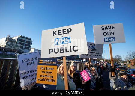 Nurses holding up placards on the picket line during strike day outside aintree university hospital fazakerley liverpool england uk 15th december 2022 Stock Photo