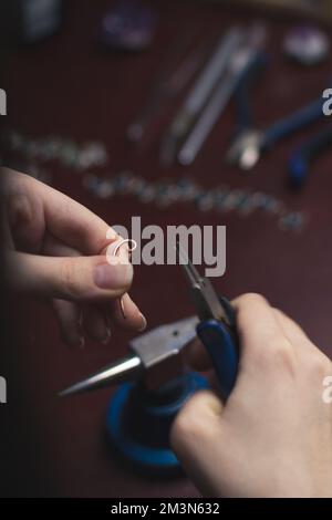 Close up jewelry manufacture process concept photo Stock Photo