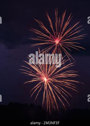 bright vibrant fireworks against a black sky Stock Photo