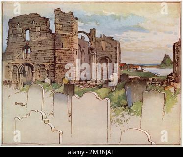 The ancient, ruined Priory at Lindisfarne, or Holy Island in Northumberland.  In the distance is the Castle standing on its whinstone crag.  Built in the 16th century, it was restored by Edwin Lutyens and now belongs to the National Trust.     Date: 1955 Stock Photo