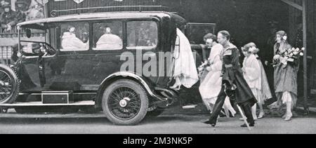 The bridesmaids attending Lady Elizabeth Bowes-Lyon on her marriage to Prince Albert, Duke of York on April 26 1923, depart Westminster Abbey after the ceremony in a car which would convey them to Buckingham Palace.     Date: 1923 Stock Photo