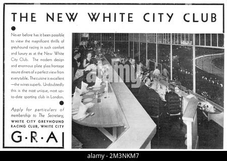 Advertisement placed by the Greyhound Racing Association during the glamorous heday of the sport for the new White City Club where diners can enjoy the magnificent thrills of greyhound racing in comfort and luxury.  In a modern design, with an enormous glass plate frontage meant that diners had a perfect view from every table.  The advert continues to extol the excellent cuisine and the superb wines at the most up-to-date sporting club in London.      Date: 1931 Stock Photo