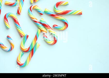 mini cherry candy canes on white background  Stock Photo