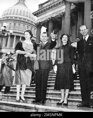 The royal visit to North America,1957. Vice president Nixon points out the surrounding landmarks on the steps of the Capitol to Queen Elizabeth II, who looks in the opposite direction. Mrs. Nixon stands next to the Duke of Edinburgh.     Date: 1957 Stock Photo