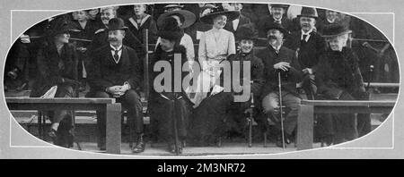 A candid photograph of Queen Alexandra and her family, laughing together at a sporting event in Copenhagen.  From left: Princess Marie Bonaparte (wife of Prince George of Greece), Prince George of Cumberland, the Dowager Empress of Russia, Princess Olga of Cumberland (seated behind), Queen Alexandra - looking particularly tickled by whatever the joke was! - Prince Waldemar of Denmark and Duchess Thyra of Cumberland.  Queen Alexandra, the Duchess of Cumberland and the Dowager Empress of Russia (formerly Princess Dagmar) were all sisters, daughters of King Christian IX of Denmark.      Date: 191 Stock Photo