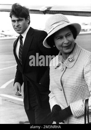 The Queen returns from Scotland    There is a breezy arrival at Heathrow airport, London, as the Queen and Prince Andrew end their holiday in Balmoral, Scotland.     Date: 9th October 1980     Date: 1980 Stock Photo