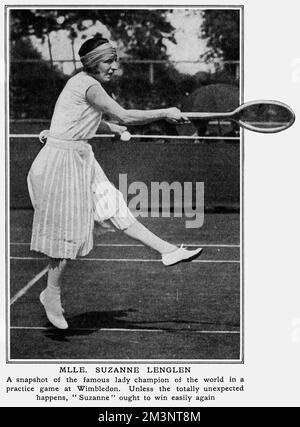 Suzanne Lenglen (1899 - 1938)  French Tennis player.  In a practice game at Wimbledon.          Date: 1923 Stock Photo