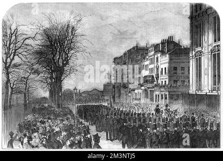 The funeral procession for the Duke of Wellington's state funeral passing through London from Chelsea Hospital where his body had been lying in state to St Paul's Cathedral where he was buried: the head of the procession at Piccadilly, the Rifle Brigade. The monumental equestrian statue of the Duke astride his horse Copenhagen atop the Wellington Arch (aka Green Park Arch or Constitution Arch) at Hyde Park Corner, can be seen in the distance.     Date: 1852 Stock Photo