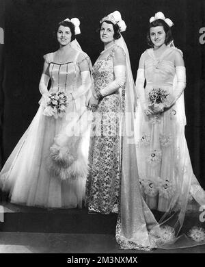 Mrs Kennedy and her deb daughters Stock Photo