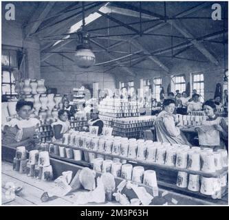 Decorating Coronation beakers 1911 Stock Photo