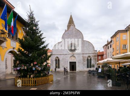 Muggia, Italy (8th December 2022) - The antique church of Saints John and Paul (santi Giovanni e Paolo) in central Piazza Marconi Square Stock Photo