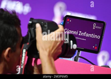 Doha, Qatar. 16th Dec, 2022. Photographer photographs FIFA President Gianni INFANTINO's name on a tablet. FIFA press conference on 16.22.2022. Closing Press Conference. Soccer World Cup 20122 in Qatar from 20.11. - 18.12.2022 ? Credit: dpa/Alamy Live News Stock Photo