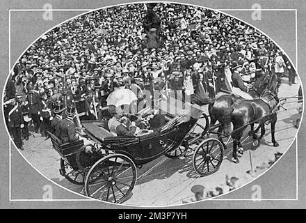 King George V and Queen Mary ride in a carriage on their way to Hull Docks where the King would perform the opening ceremony of the new joint dock.     Date: 26 June 1914 Stock Photo