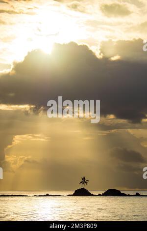 Sunrise over beautiful tropical island in the south Pacific in Papua Stock Photo