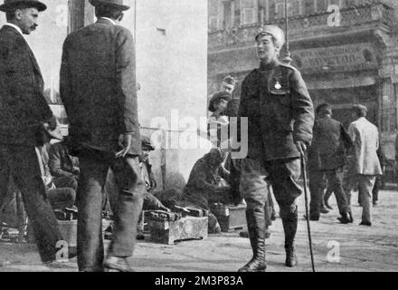 Flora Sandes (22 January 1876  24 November 1956) was the only British woman officially to serve as a soldier in World War I. Initially a St. John Ambulance volunteer, she travelled to Serbia, where, in the confusion of war, she was formally enrolled in the Serbian army. She was subsequently promoted to the rank of Sergeant major, and, after the war, to Captain.  The Serbians called her 'Our Jeanne d'Arc' and she is pictured here taking her first walk in Salonika after being severely wounded by a grenade during hand to hand fighting in the trenches.       Date: 1917 Stock Photo