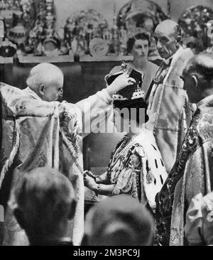 The crowning of Her Majesty Queen Elizabeth (1900- 2002), 1937. George VI's coronation took place on 12th May 1937 at Westminster Abbey, the date previously intended for his brother Edward VIII's coronation. Stock Photo