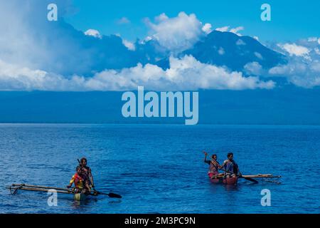 Clouds forming above volcano in the south Pacific Ocean - Ring of fire Volcano in Papua Stock Photo