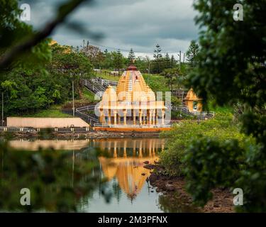 Grand bassin is a relegious place for meditation, pray and relax. Famous touristical destination in Mauritius island.  More hidu gods statue in this p Stock Photo