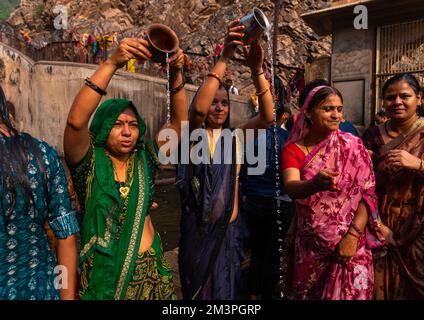 Indian pilgrims having a bath in Galtaji temple aka monkey temple, Rajasthan, Jaipur, India Stock Photo