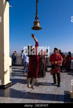 Indian people ringing bell in Savitri Temple, Rajasthan, Pushkar, India ...