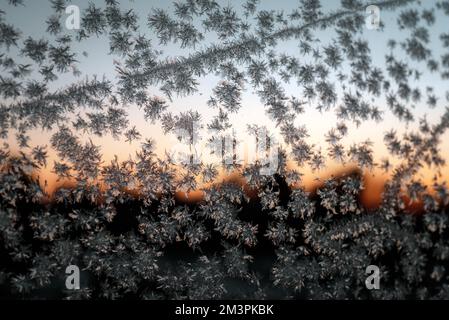 frost painted patterns on the window Stock Photo - Alamy