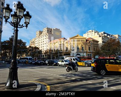 Traffic at the intersection between Passeig de Gràcia and Gran Via. Barcelona, Catalonia, Spain. Stock Photo