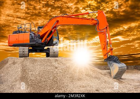 excavator ist working and digging at construction site Stock Photo