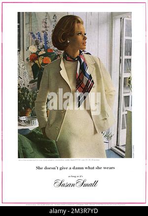 Advertisement for the fashion house, Susan Small, featuring a model wearing a dress and jacket in fine worsted twill with a scarf tied around her neck.       Date: 1965 Stock Photo