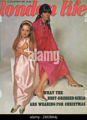 Front cover of London Life magazine featuring mother and daughter models wearing evening and party wear for Christmas 1966.  The woman wears a Thai shocking pink silk quilted coat and dress by Design Thai and shoulder-length pink sequin earrings by Adrien Mann.  Gold sandals from Elliott.  The little girl's long dress is in pink silk and from Harrods.    1966 Stock Photo