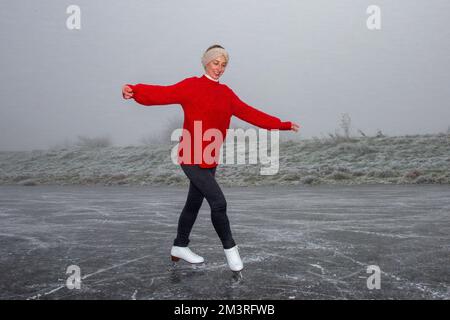 Picture dated December 11th shows  Hannah Straughan practising her skating on the frozen Cambridgeshire Fens near Ely on a foggy Sunday morning as the Stock Photo