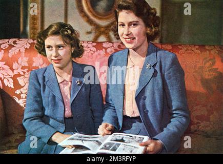 Princess Elizabeth, later Queen Elizabeth II (1926 - ) and her younger sister Princess Margaret Rose (1930 - 2002) pictured together. An exclusive photographic sitting of the royal family specially granted to the Illustrated London News to mark their centenary at that time.      Date: 1942 Stock Photo