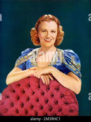 English singer and actress, Gracie Fields (1898-1979), pictured at the time she was recovering from an operation and when the film, Shipyard Sally, in which she was starring, was released.      Date: 1939 Stock Photo