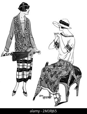 Two young stylish ladies wearing the following outfits: A Jenner brushed-wool tomato sports coat, ornamented (accessorised) with shaded blue embroidery (left) and a lovely dress of mastic artificial silk with a shaded brown wool pattern introduced in the silk lace skirt.     Date: 1923 Stock Photo