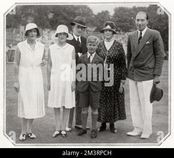 Celebrities at the Maidenhead Fishery Club in 1931.  From left, the Marchioness of Milford Haven, formerly Countess Nada Torby, daughter of Grand Duke Michael of Russia, her daughter, Lady Tatiana Mountbatten, the Marquess of Milford Haven (formerly Prince George of Battenberg), Prince Philip of Greece (now Duke of Edinburgh), the Dowager Marchioness of Milford Haven, formerly Princess Victoria of Hesse (Princess Louis of Battenberg), daughter of Princess Alice and granddaughter of Queen Victoria.  On the right is the Count de Torby, Nada's brother Michael.  Prince Philip would regularly spend Stock Photo