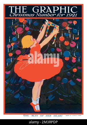 Striking front cover design for The Graphic Christmas number 1921 featuring a little girl in a red dress decorating an enormous Christmas tree and holding a Harlequin doll in the air.       Date: 1921 Stock Photo